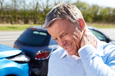 Man suffering neck pain after a personal injury accident