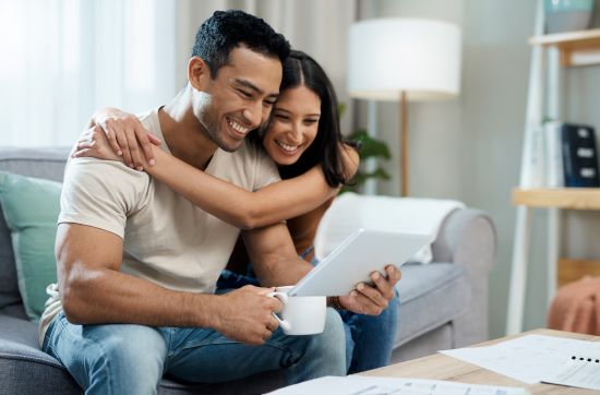 happy couple sell structured settlement payments