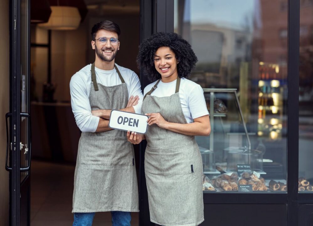 happy couple starting a new business after selling structured settlement