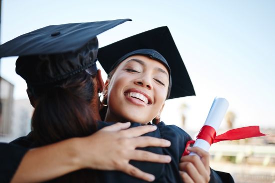 happy woman graduating college